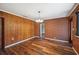 Spacious dining area with wood and brick walls, and vinyl floors at 1830 Casco, Lakeland, FL 33801