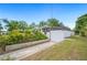 Charming single-story home with a screened porch and beautifully landscaped yard, perfect for outdoor enjoyment at 1830 Casco, Lakeland, FL 33801