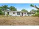 Exterior view of the house with a big front yard and basic landscape at 1830 Casco, Lakeland, FL 33801