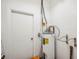 Utility room with water heater, plumbing, and electrical components at 1830 Casco, Lakeland, FL 33801