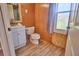 Bright bathroom featuring a single vanity and natural light at 200 Spurlock Rd, Frostproof, FL 33843