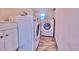 Compact laundry room with a washer and dryer at 200 Spurlock Rd, Frostproof, FL 33843