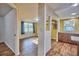 Bright living space filled with natural light and connected to the kitchen and other rooms at 200 Spurlock Rd, Frostproof, FL 33843