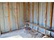 Shed interior featuring the frame, concrete floor, and built in bench at 200 Spurlock Rd, Frostproof, FL 33843