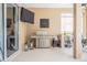 Well-equipped patio with a built-in grill and decorative wall art for outdoor entertaining at 2026 Indian Sky Cir, Lakeland, FL 33813