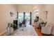 Cozy sitting area with exercise equipment and sliding glass doors to outdoor patio at 2026 Indian Sky Cir, Lakeland, FL 33813
