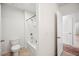 Small bathroom featuring tiled floor, white walls, bathtub and toilet at 2062 Blue Highlands Dr, Lakeland, FL 33811