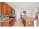 Stylish kitchen featuring granite countertops, stainless steel appliances, and an island with sink at 2062 Blue Highlands Dr, Lakeland, FL 33811