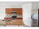 Modern kitchen features granite countertops, stainless steel appliances, and ample cabinet space at 2062 Blue Highlands Dr, Lakeland, FL 33811