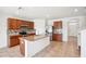 Spacious kitchen with an island, stainless steel appliances and stylish granite countertops at 2062 Blue Highlands Dr, Lakeland, FL 33811