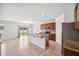 Spacious kitchen featuring granite countertops, stainless steel appliances, and a large island at 2062 Blue Highlands Dr, Lakeland, FL 33811