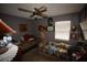 Simple bedroom with sofa and natural light from a window at 240 Lake Thomas Dr, Winter Haven, FL 33880