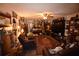 Large living room with vintage decor, ceiling fan and comfortable seating at 240 Lake Thomas Dr, Winter Haven, FL 33880