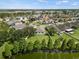 Beautiful aerial view of neighborhood homes with lake view and large backyards at 2544 Ladoga Dr, Lakeland, FL 33805