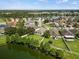 Aerial view of waterfront homes with lake views, featuring spacious yards and landscaping at 2544 Ladoga Dr, Lakeland, FL 33805