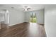 Bright bedroom features hardwood floors and sliding glass doors to the backyard at 2544 Ladoga Dr, Lakeland, FL 33805