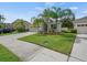 Charming single-story home with landscaped front yard and driveway; new lawn at 2544 Ladoga Dr, Lakeland, FL 33805