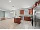 Spacious kitchen features island and stainless steel appliances at 2544 Ladoga Dr, Lakeland, FL 33805
