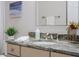 Bathroom vanity with a granite countertop and vessel sink at 2714 Highlands Vue Pkwy, Lakeland, FL 33813