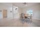 Dining room with natural light, complemented by stylish furnishings and a clean, neutral color palette at 2714 Highlands Vue Pkwy, Lakeland, FL 33813