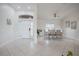 Bright entryway with beautiful tile floors leads to the formal dining room and other areas of the home at 2714 Highlands Vue Pkwy, Lakeland, FL 33813