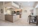 Spacious kitchen with an island, stainless steel appliances, light wood cabinets, and an eat-in nook, open layout at 2714 Highlands Vue Pkwy, Lakeland, FL 33813