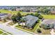 Aerial view of a meticulously maintained home with mature trees and landscaping at 2817 High Winds Ln, Lakeland, FL 33813