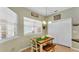 Bright breakfast nook illuminated by natural light from the window at 2817 High Winds Ln, Lakeland, FL 33813
