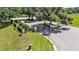 Community entrance with lush landscaping and a secure gated entry for privacy at 2817 High Winds Ln, Lakeland, FL 33813