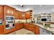 Well-appointed kitchen with custom cabinets, stainless steel appliances, and an open layout at 2817 High Winds Ln, Lakeland, FL 33813
