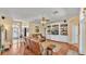 Inviting living room featuring hardwood floors and built-in shelving at 2817 High Winds Ln, Lakeland, FL 33813
