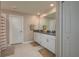 Bathroom featuring double sinks, granite countertops, and tiled floors at 2958 Flying Blackbird Rd, Bartow, FL 33830
