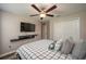 Bedroom featuring modern decor, wood-look flooring and ceiling fan at 2958 Flying Blackbird Rd, Bartow, FL 33830