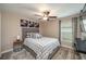 Bedroom featuring modern decor, wood-look flooring and ceiling fan at 2958 Flying Blackbird Rd, Bartow, FL 33830