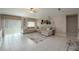 Bright living room with a comfortable sectional sofa and stylish decor at 2958 Flying Blackbird Rd, Bartow, FL 33830