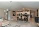 Open floor plan with the kitchen, dining, and living area providing abundant space and light at 2958 Flying Blackbird Rd, Bartow, FL 33830