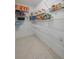Well-organized walk-in pantry with ample shelving for storage at 2958 Flying Blackbird Rd, Bartow, FL 33830