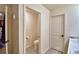 Toilet room with tiled floors is located inside the main bathroom at 312 Walnut Ln, Auburndale, FL 33823