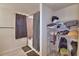 Bathroom featuring a shower/tub combo and adjacent storage at 312 Walnut Ln, Auburndale, FL 33823