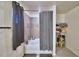 Bathroom featuring a shower/tub combo with storage at 312 Walnut Ln, Auburndale, FL 33823