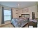 Comfortable bedroom featuring a cozy bed and ample natural light at 312 Walnut Ln, Auburndale, FL 33823