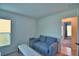 Living room features seating area, bench and natural light from windows at 312 Walnut Ln, Auburndale, FL 33823