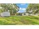 This spacious backyard with a shed is perfect for outdoor enjoyment at 3235 Sandpiper Ln, Mulberry, FL 33860