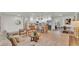 Open-concept living space with a stylish kitchen island, comfortable seating, and modern decor at 3235 Sandpiper Ln, Mulberry, FL 33860