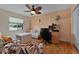 This bedroom/office space features a desk, a day bed, and a window with a pleasant view at 3783 Wildcat Run, Lakeland, FL 33810