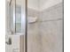 Enclosed shower featuring stylish tilework and modern fixtures at 3787 Sandhill Crane Dr, Lakeland, FL 33811