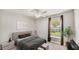 Bright bedroom features a large window and a ceiling fan at 3787 Sandhill Crane Dr, Lakeland, FL 33811