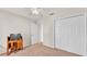 Bedroom features a closet, natural light, and an open doorway at 3787 Sandhill Crane Dr, Lakeland, FL 33811