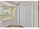Cozy breakfast nook with natural light from the corner window, and a pantry closet at 3787 Sandhill Crane Dr, Lakeland, FL 33811