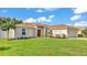 Charming single-Gathering home featuring a well-maintained lawn and two car garage at 3787 Sandhill Crane Dr, Lakeland, FL 33811